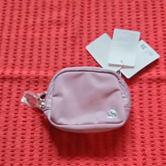 lululemon athletica Handbags - Lululemon Lilac Mini Pouch